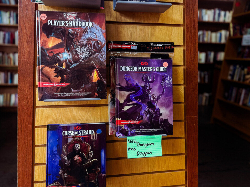 The bookshelf at Southland Books features an array of new Dungeons and Dragons guides.