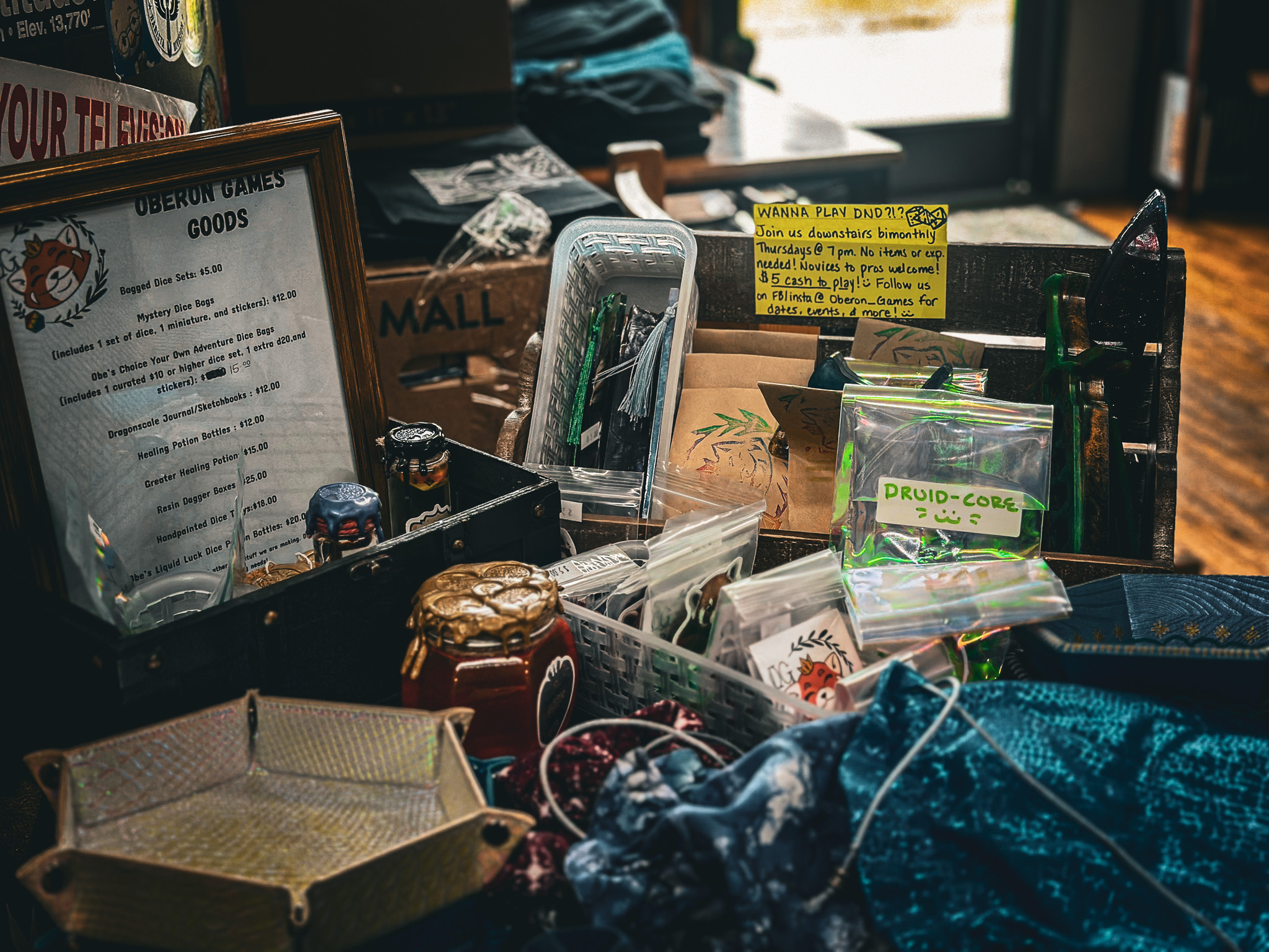 Oberon Games and Emily Pack Pottery make a variety of accessories for Dungeons and Dragons, displayed for sale at Southland Books.